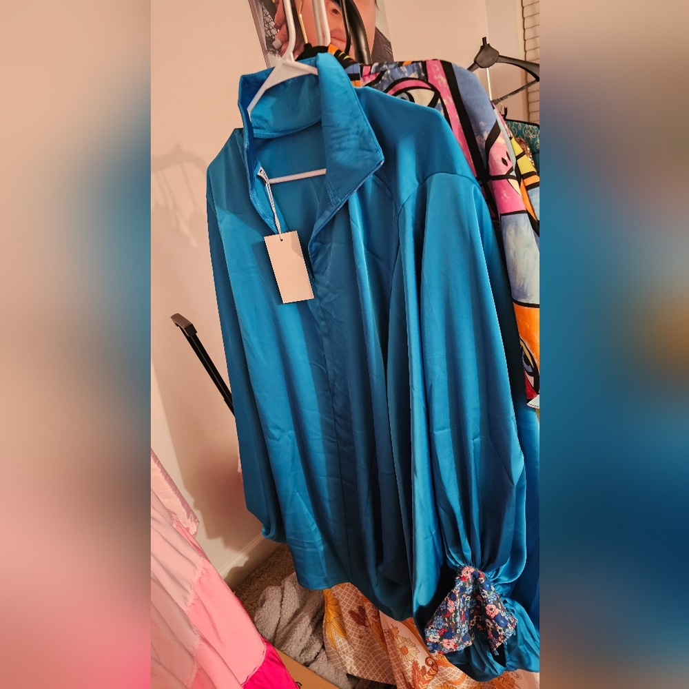 Brand new turquoise blouse